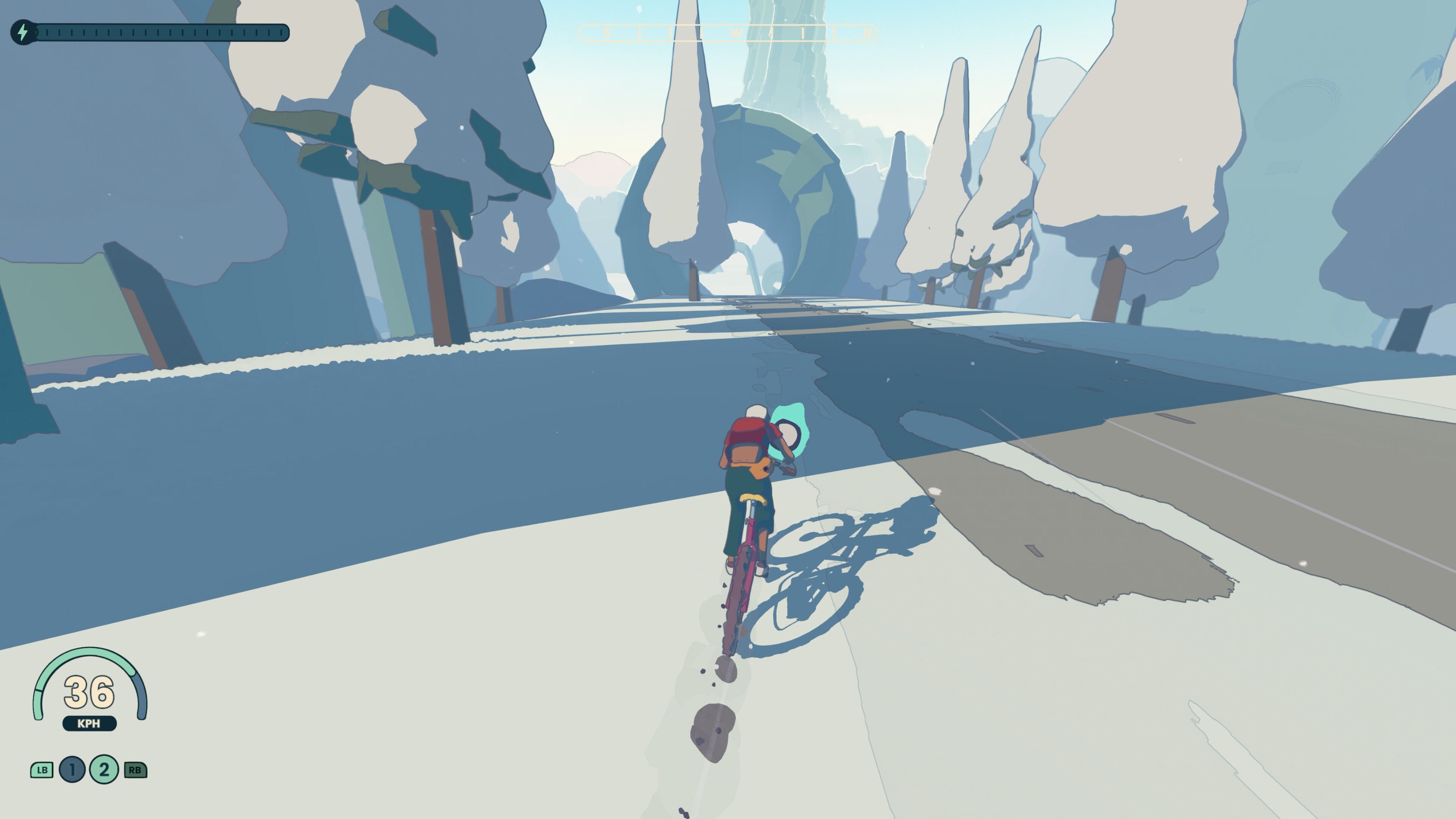 Screenshot from Wheel World video game of Kat and Skully riding their bike in a winter forest