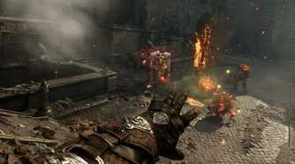 Screenshot from Witchfire video game of player character lighting enemies on fire in castle setting