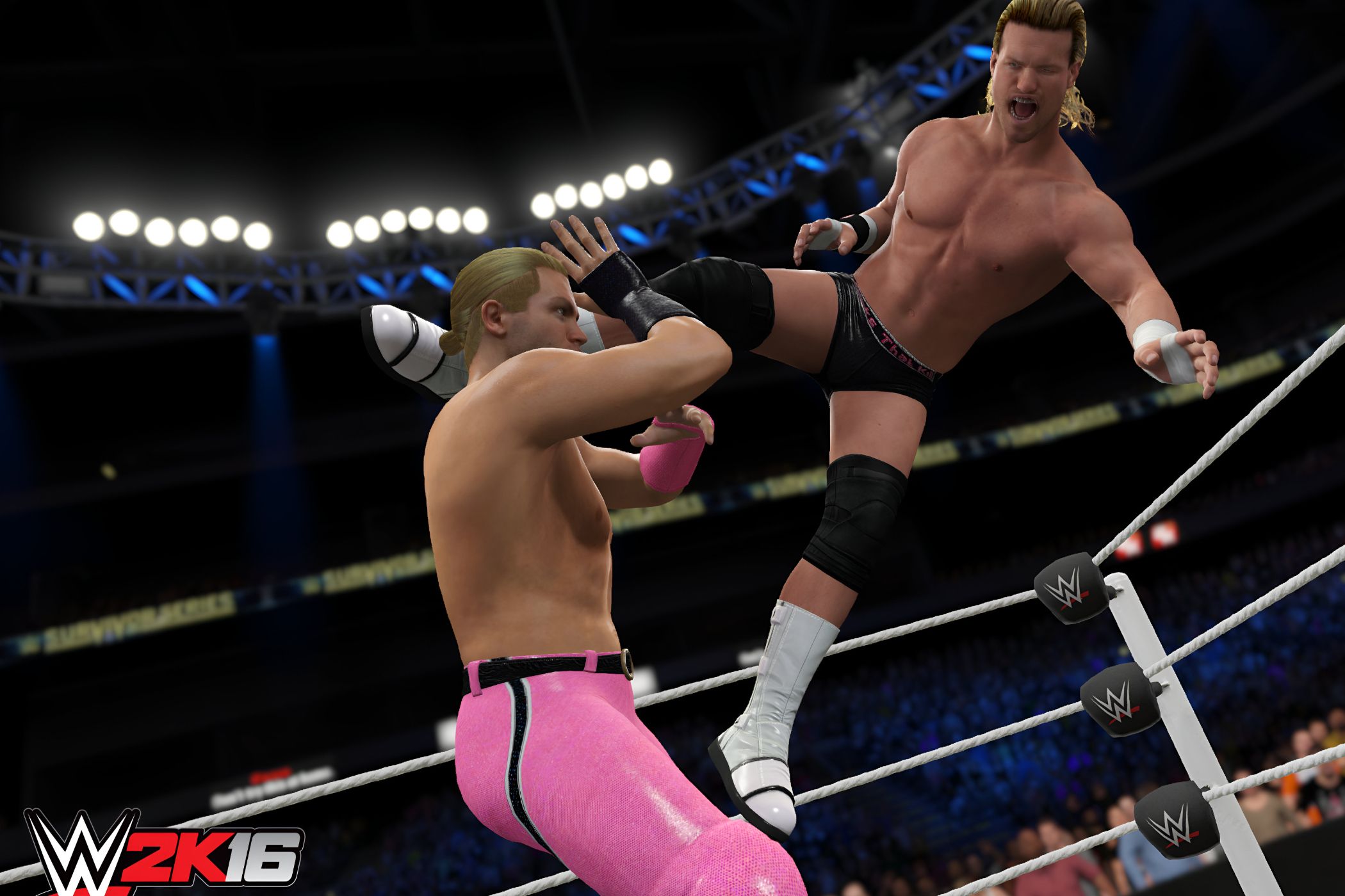 A screenshot from WWE 2K16, showing former WWE superstar Dolph Ziggler take to the air to attack his opponent in pink tights.
