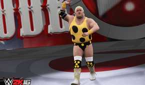 A screenshot from WWE 2K16, showing Dusty Rhodes, a healthy old man with short blonde hair, wearing a polka-dotted yellow outfit, enter the arena while raising one hand in the air.