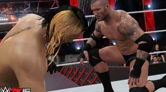A screenshot from WWE 2K16, showing a bald Randy Orton lean across the ring from Seth Rollins, sporting blonde and black hair.