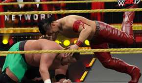 A screenshot from WWE 2K17, showing Shinsuke Nakamura attack a crouched Samoa Joe wearing green shorts.