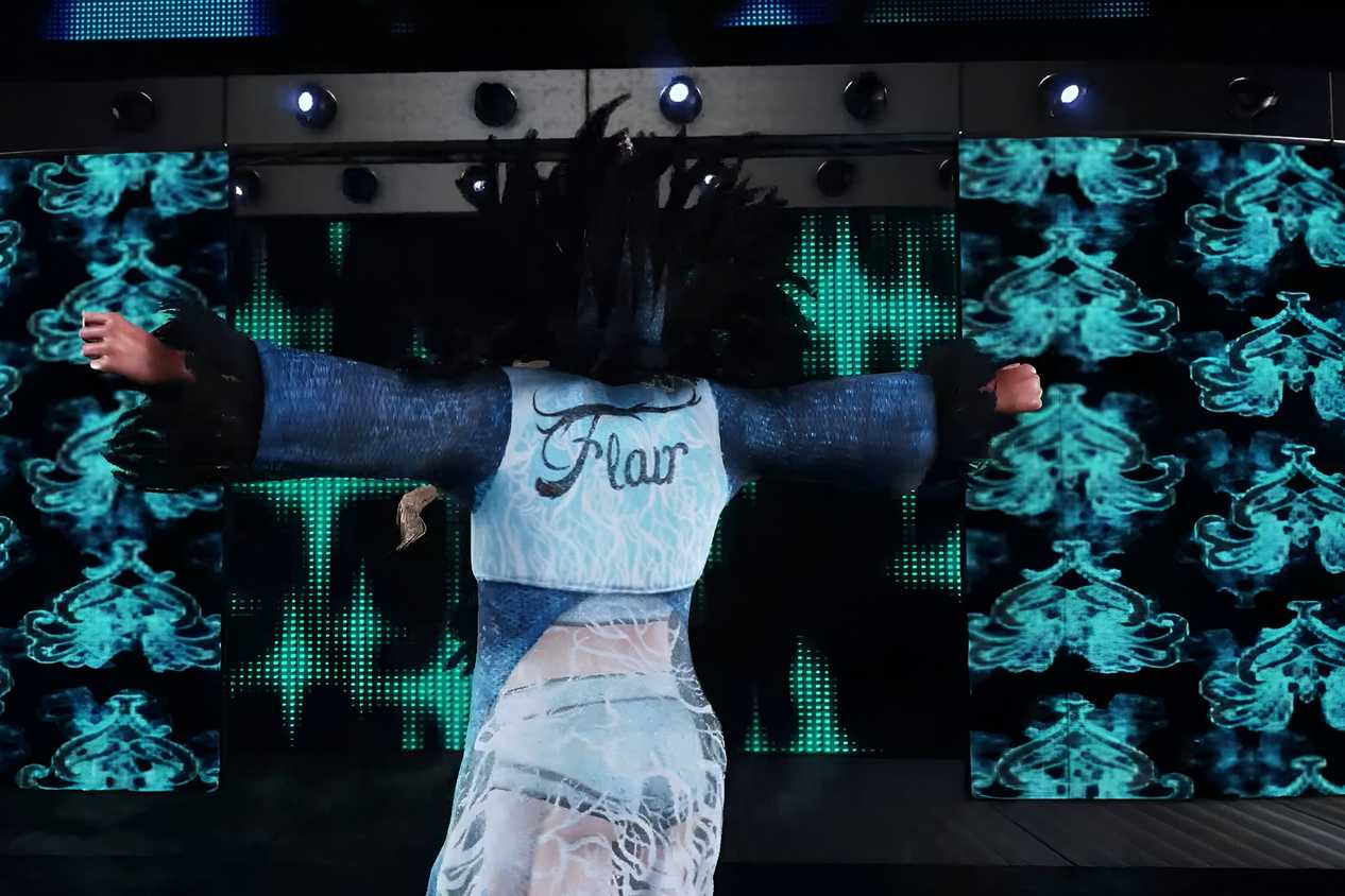 A screenshot from WWE 2K18, showing Charlotte Flair make her entrance.