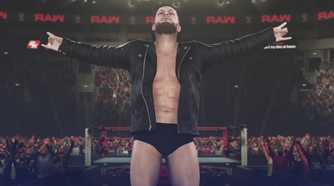 A screenshot from WWE 2K18, showing Finn Balor in an unzipped black jacket.