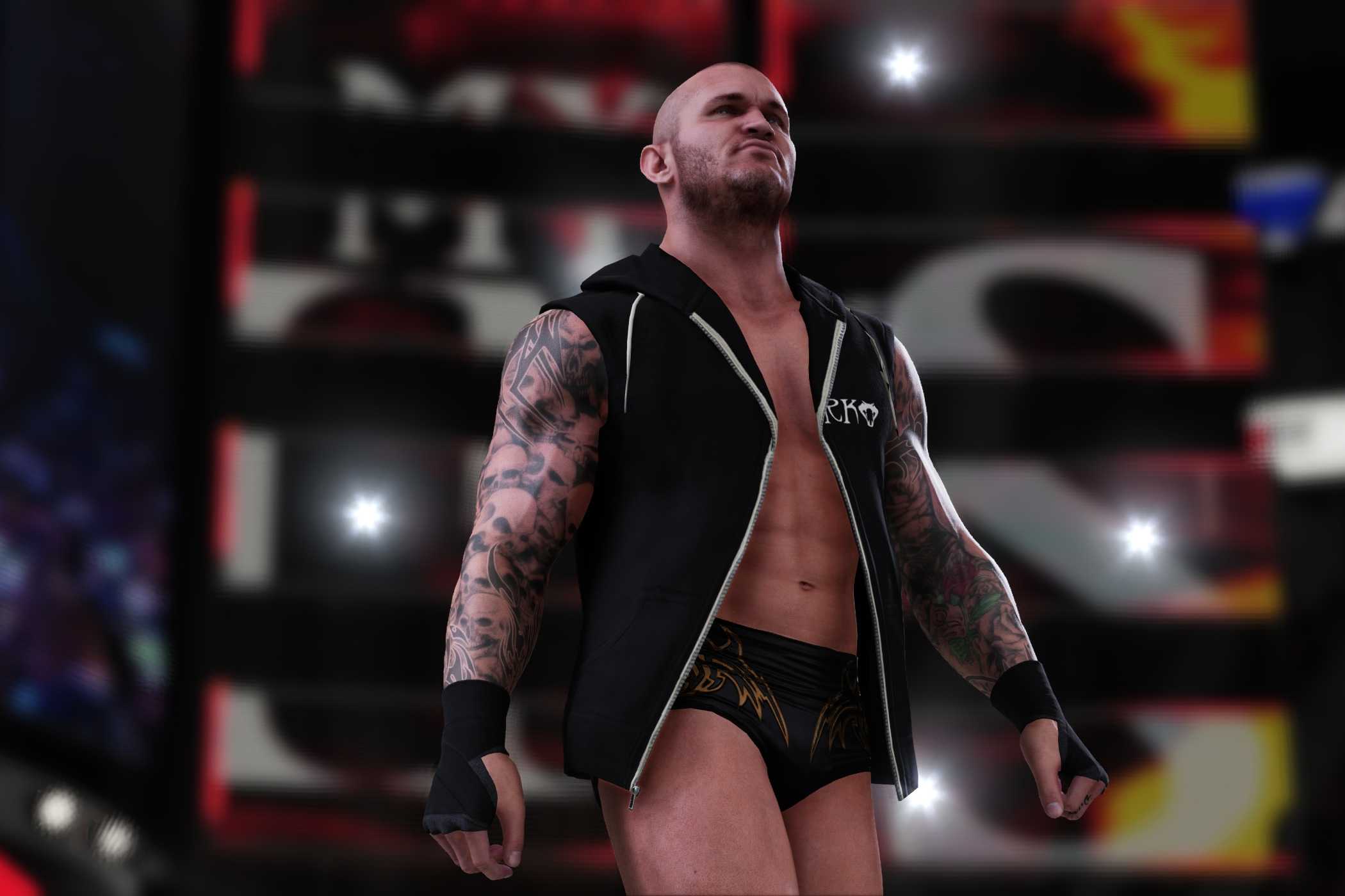 A screenshot from WWE 2K18, showing Randy Orton, wearing a sleeveless black zipper jacket.