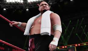 A screenshot from WWE 2K18, showing Samoa Joe make his way to the ring with a white towel around his shoulders.