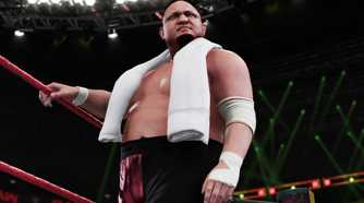 A screenshot from WWE 2K18, showing Samoa Joe make his way to the ring with a white towel around his shoulders.