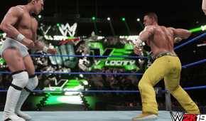 A screenshot from WWE 2K19, showing John Cena, wearing yellow pants, face off against Bryan Danielson in white tights, inside the ring.