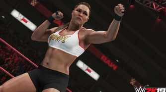 A screenshot from WWE 2K19, showing Rowdy Ronda Rousey taking a boxing stance.