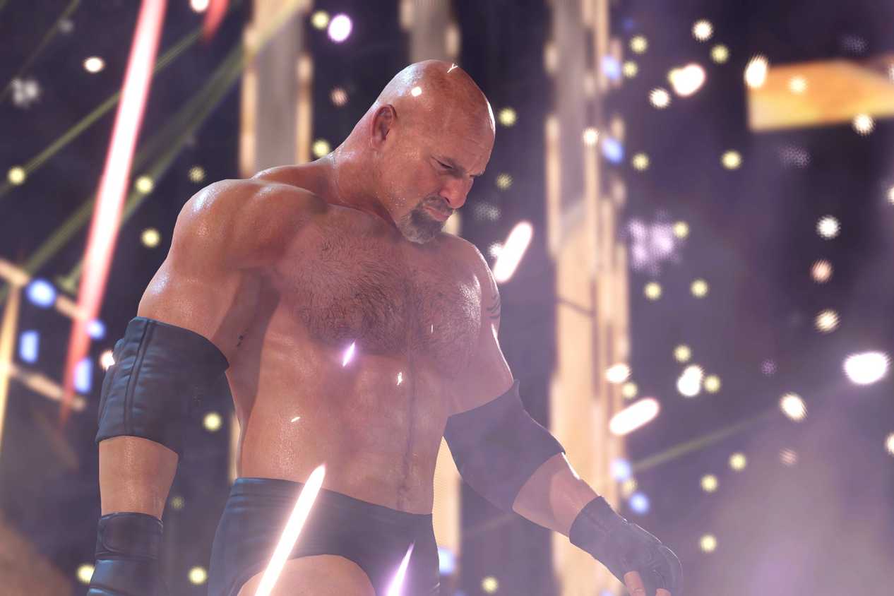 A screenshot from WWE 2K22, showing Bill Goldberg make his entrance as pyro goes off around him.