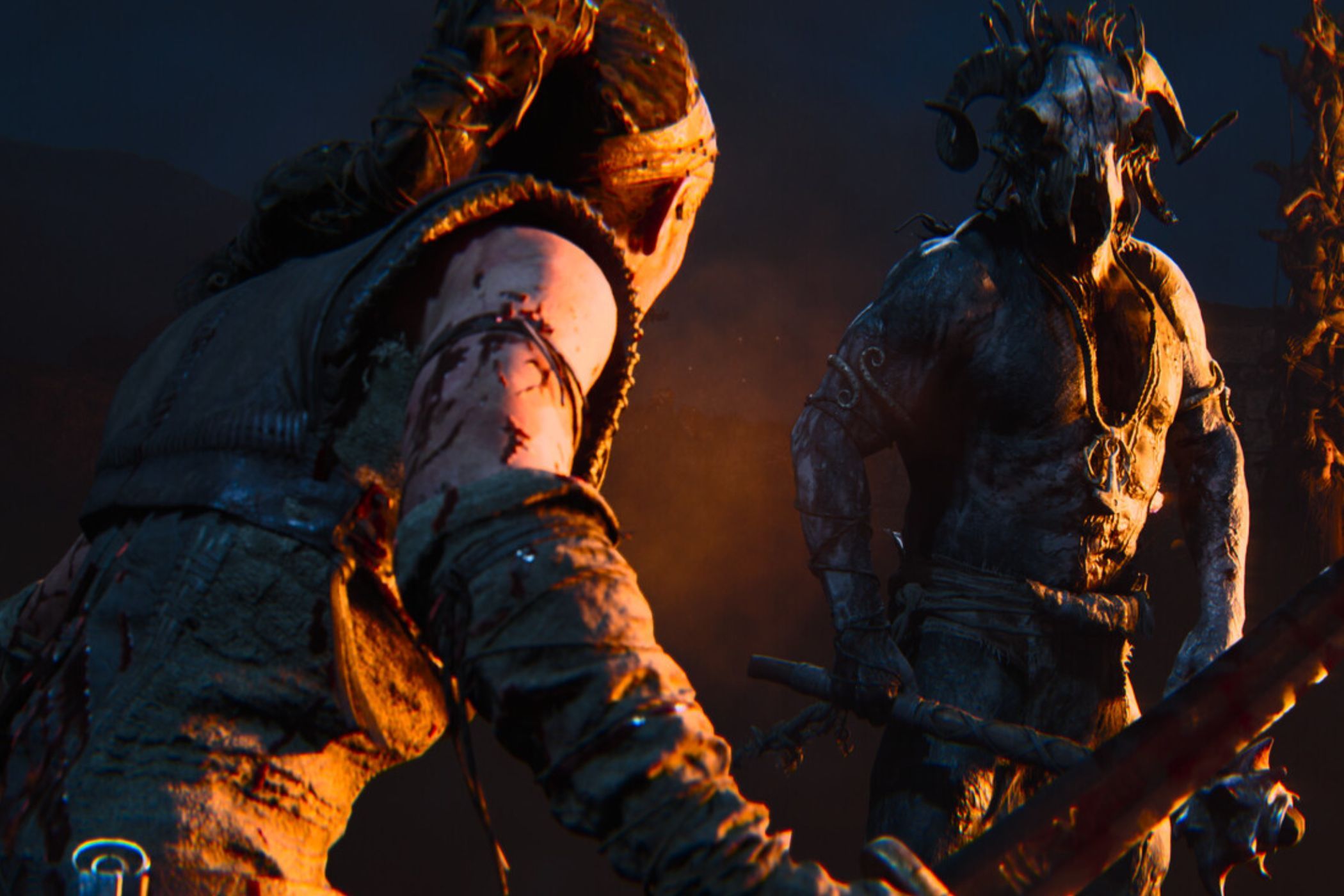 Hellblade 2 Senua attacking enemy in tribal garb