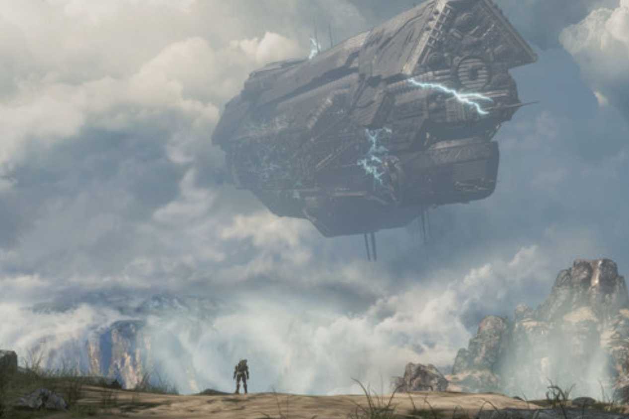 Master Chief Collection Master Chief standing on cliff below space ship