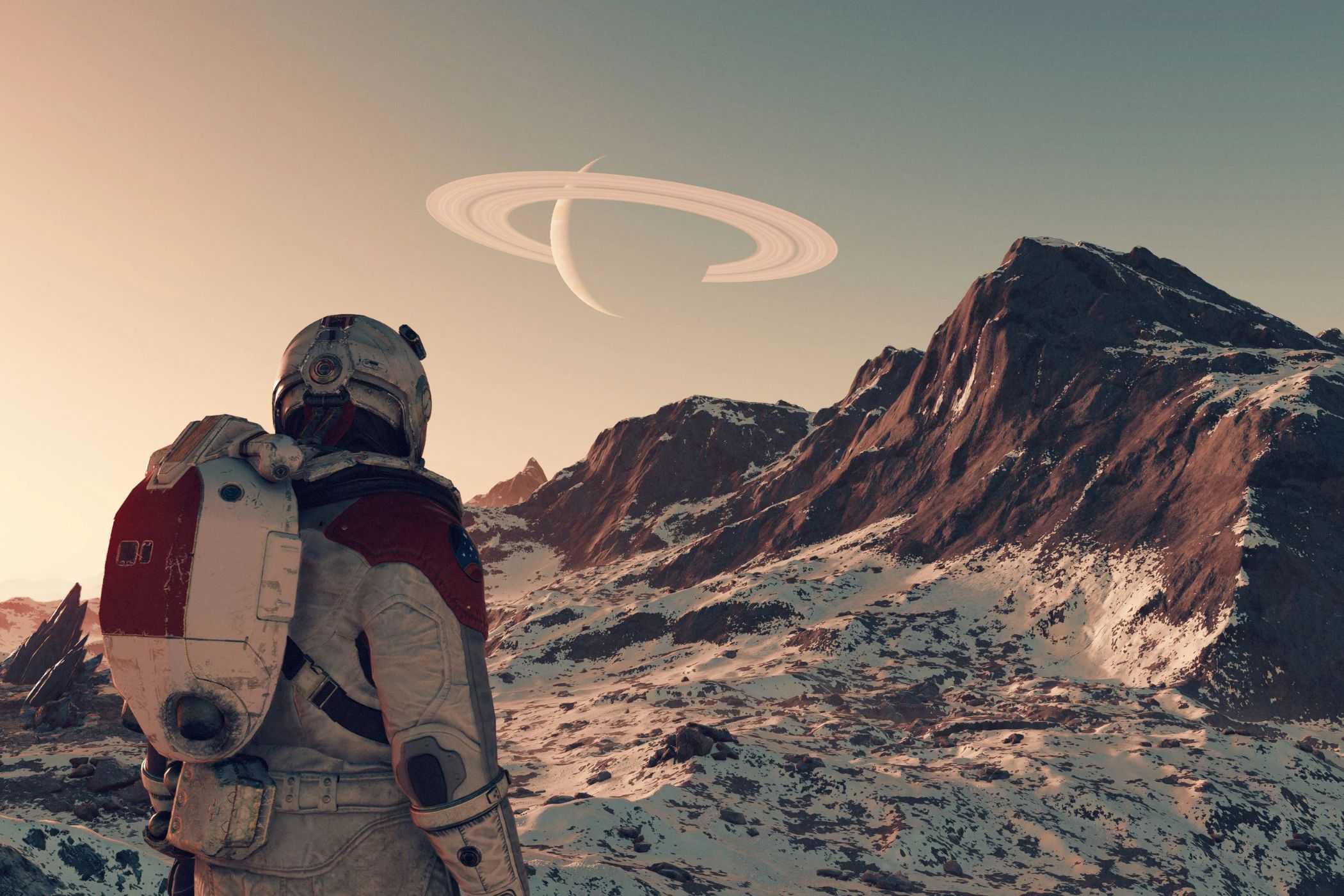 Starfield astronaut exploring icy and mountainous planet