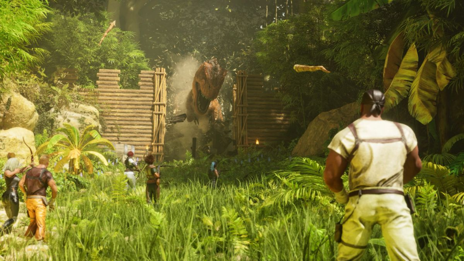 A dinosaur breaking through a wooden gate