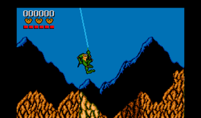 a toad swinging on a rope