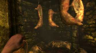 A screenshot from the game Amnesia: The Dark Descent, showing stuck pigs hanging from metal hooks.