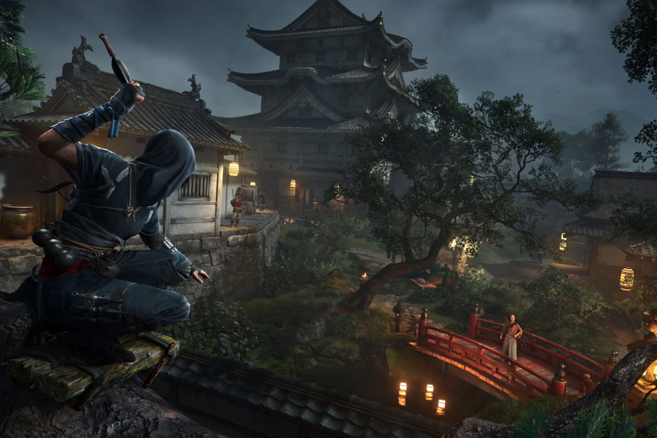 A screenshot from Assassin's Creed Shadows, showing the protagonist Naoe sneaking around in a temple at night.