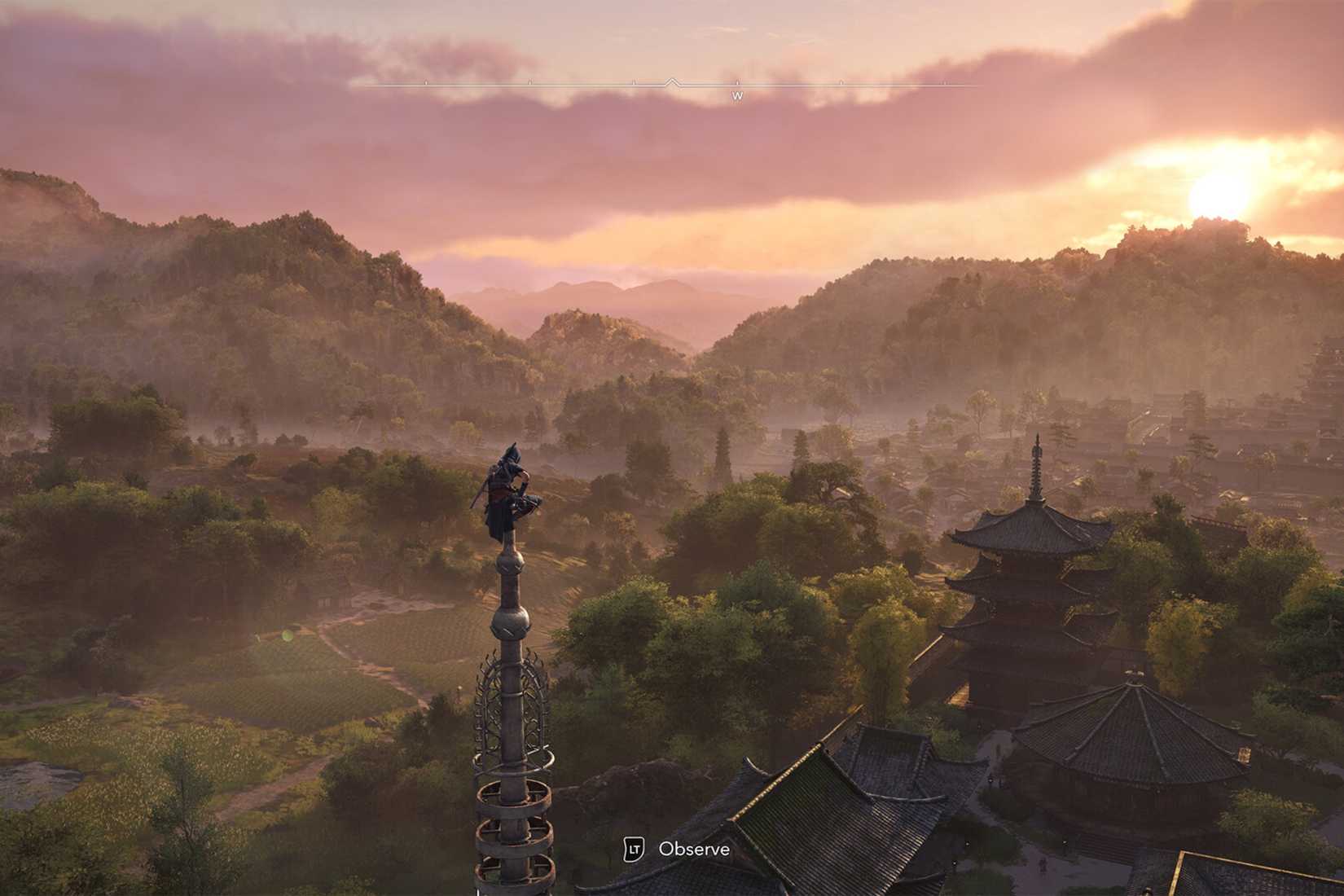 A screenshot from Assassin's Creed Shadows, showing the protagonist Naoe perched atop a tall pillar, taking in the mountainside.