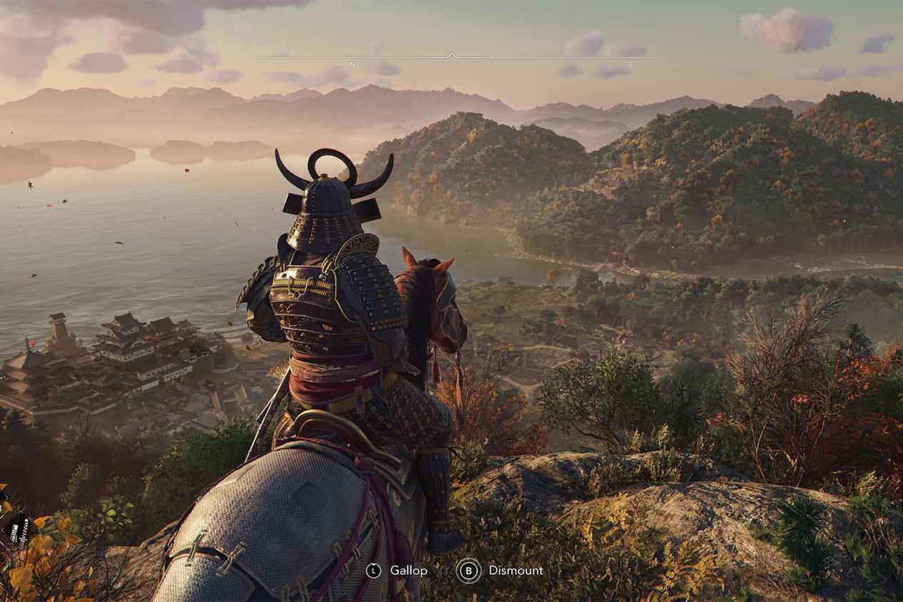 A screenshot from Assassin's Creed Shadows, showing Yasuke, the secondary protagonist, on horseback, looking over at a valley.