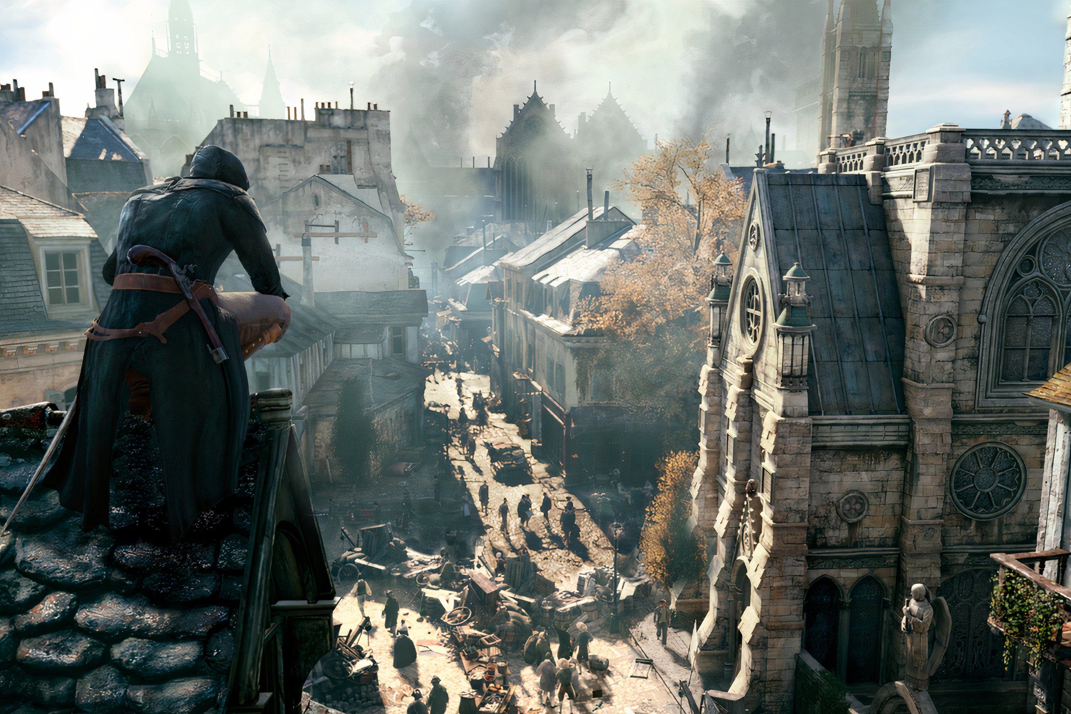 An image from Assassin's Cred Unity, showing an Assassin perched atop a roof, overlooking the streets of 18th century Paris.