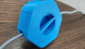 cable organizer with a wire passing through it