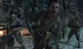 Screenshot from Call of Duty: World at War video game of soldiers running on a beach in jungle setting.