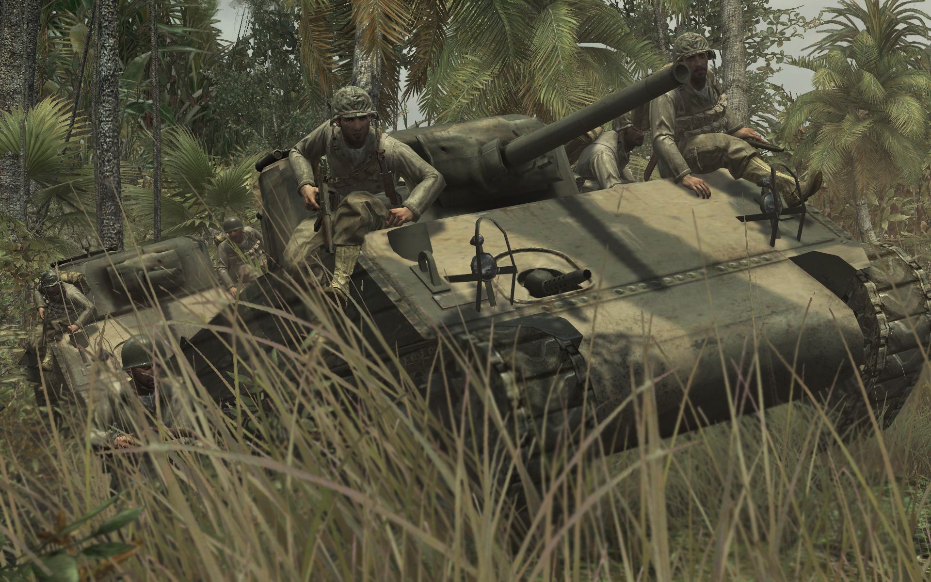 Screenshot from Call of Duty: World at War video game of soldiers on a tank in jungle setting