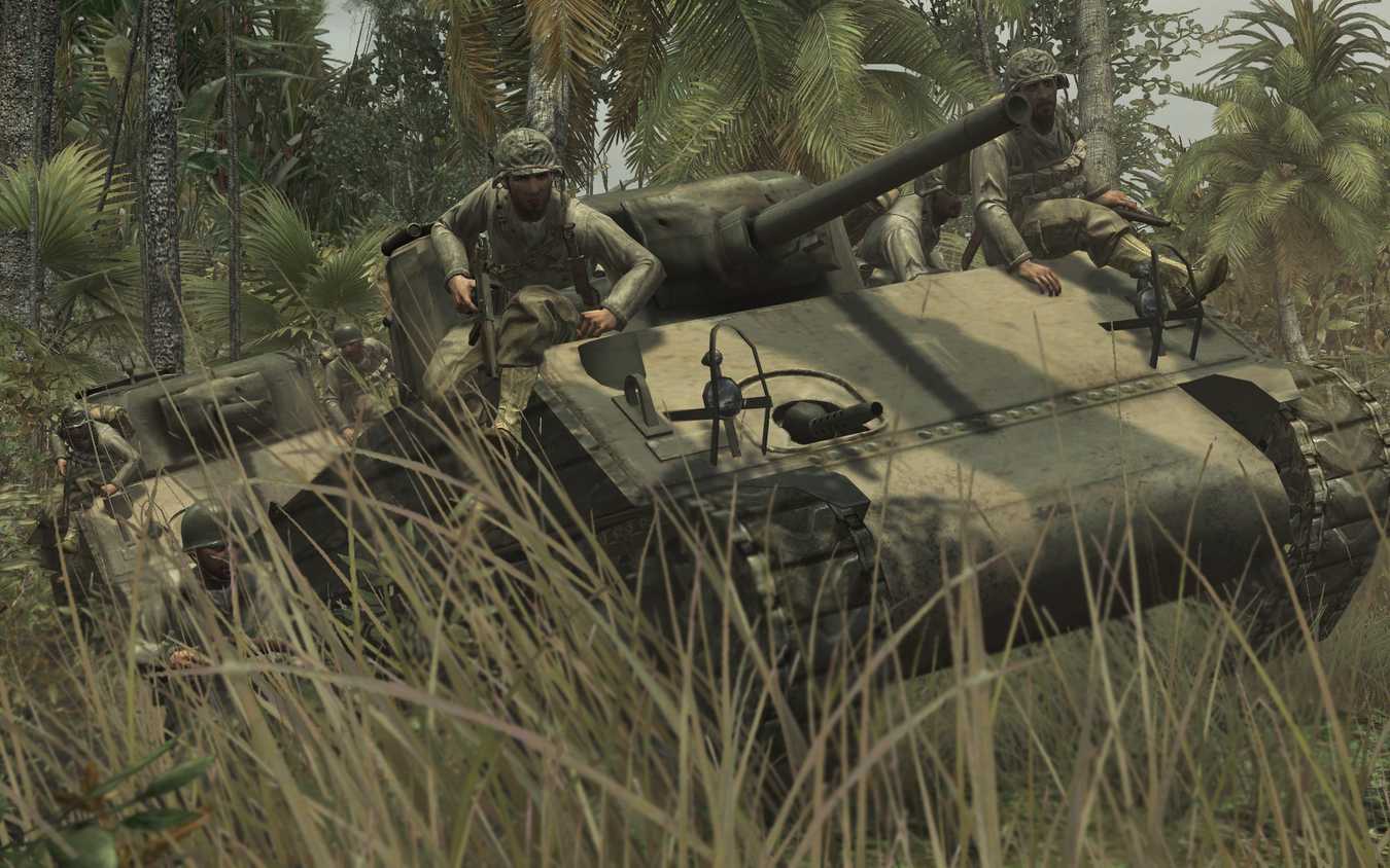 Screenshot from Call of Duty: World at War video game of soldiers on a tank in jungle setting