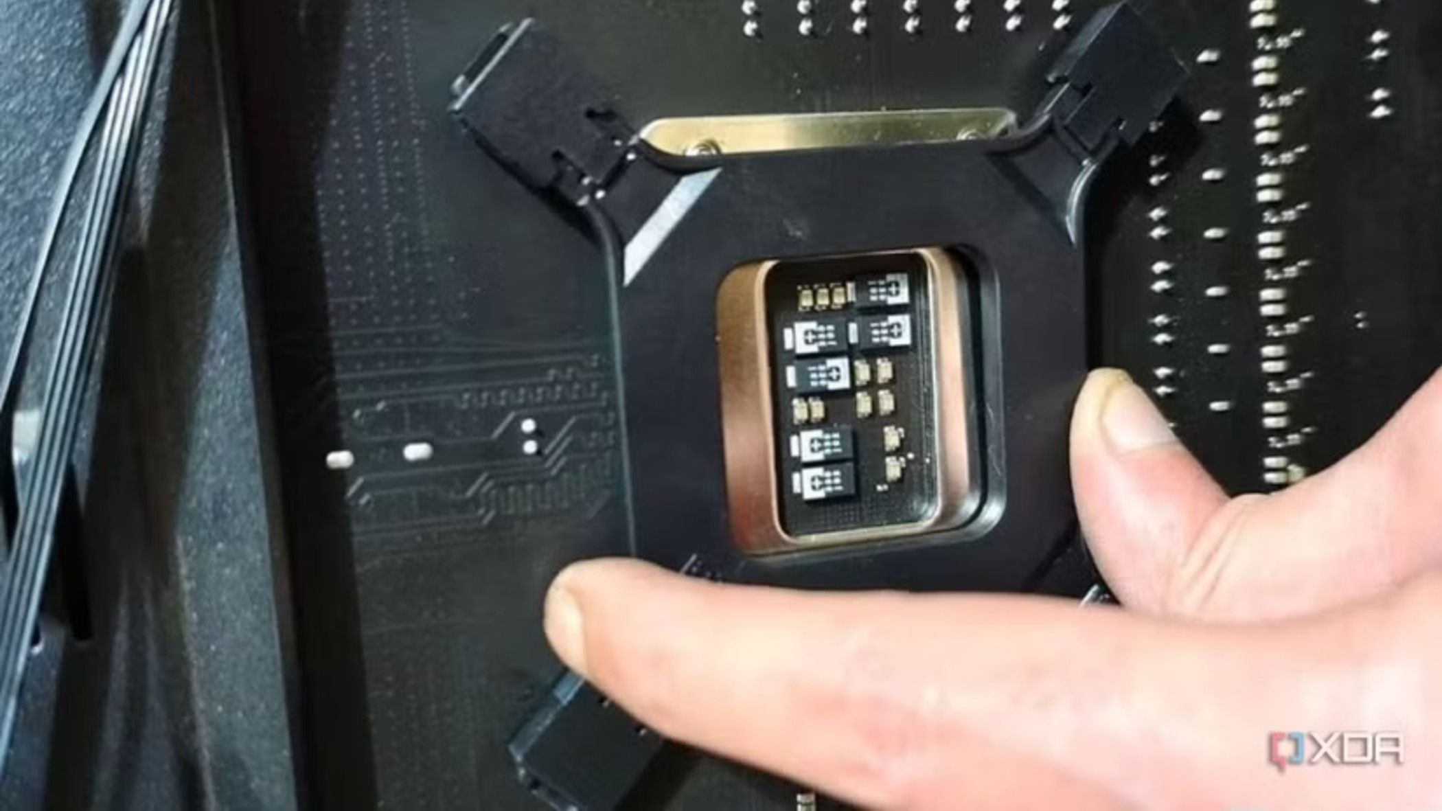 cpu-cooler-backplate-being-installed-on-the-motherboard
