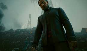 An image from Cyberpunk 2077, showing Goro Takemura in a black coat, standing in a landfill.