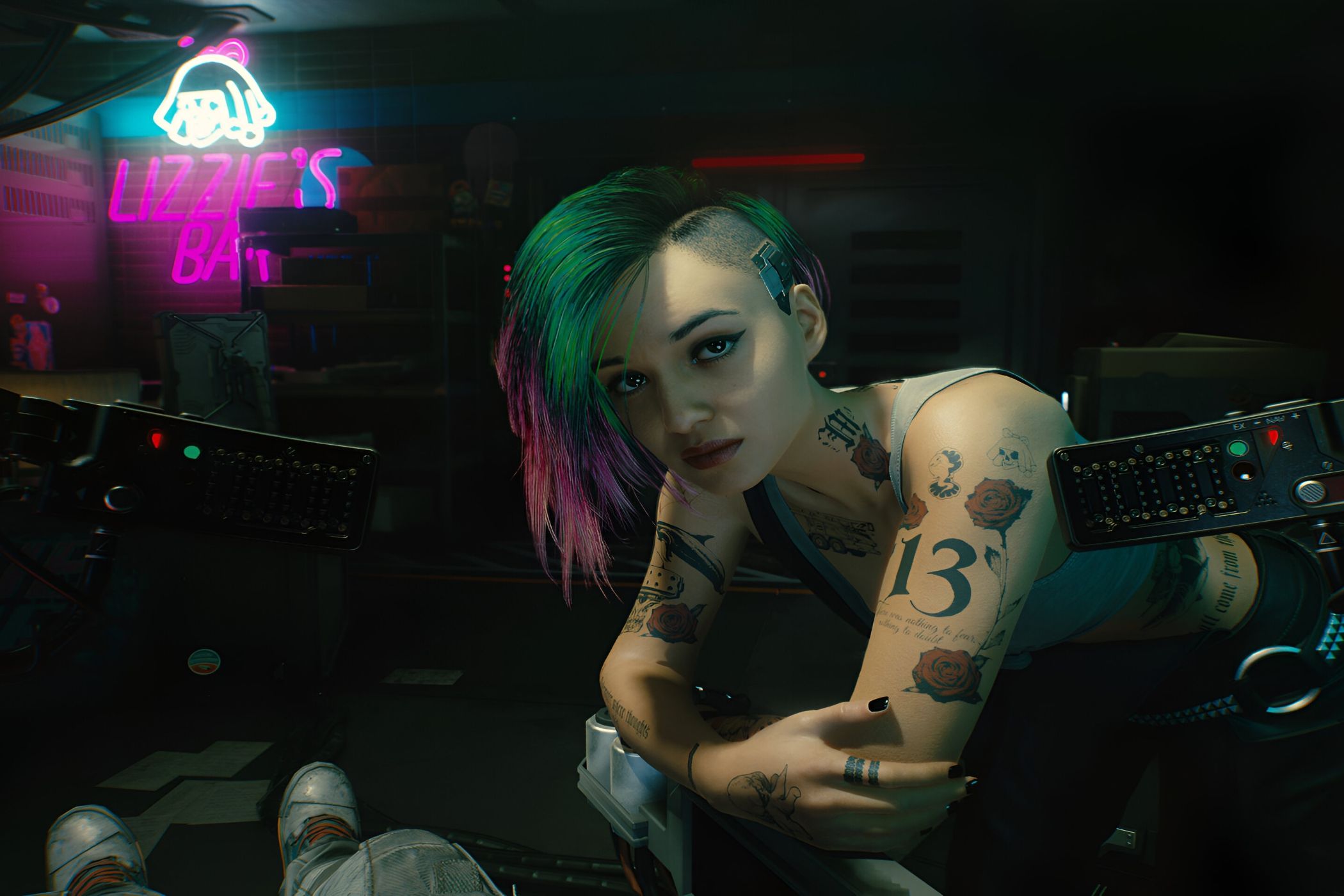 An image from Cyberpunk 2077, showing Judy Alvarez leaning over the protagonist.