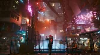 An image from Cyberpunk 2077, showing the neon-lit Night City at nighttime.