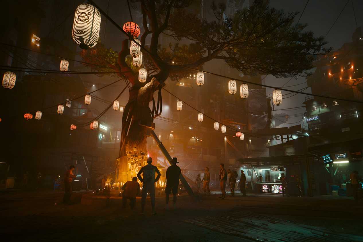 An image from Cyberpunk 2077, showing a memorial tree in Dogtown, the new district in the game.