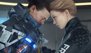 An image from the game "Death Stranding", showing a man and a woman touching their foreheads.