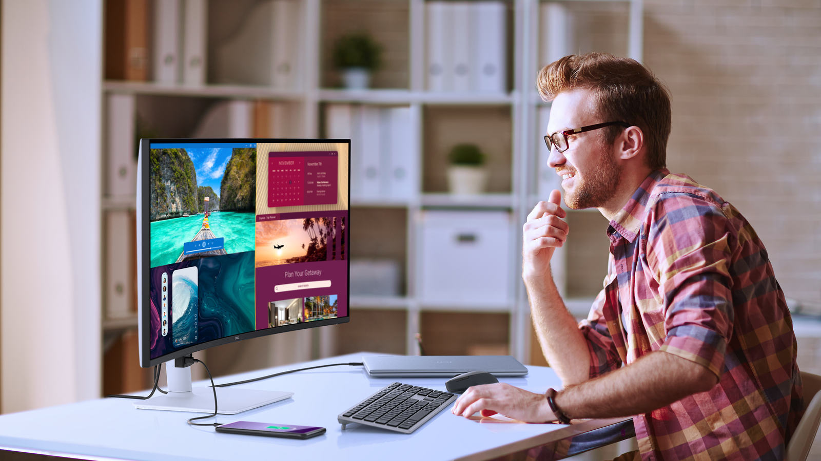A 34-inch Dell monitor sitting on a desk. 