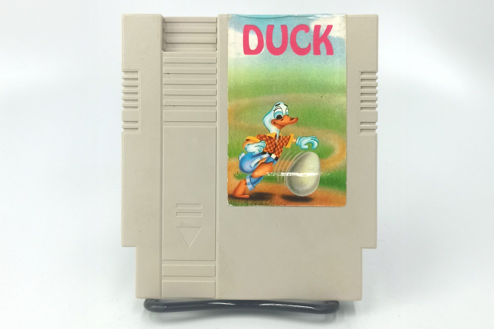 duck-cartridge-brazil-NES-front_source-livros-universo