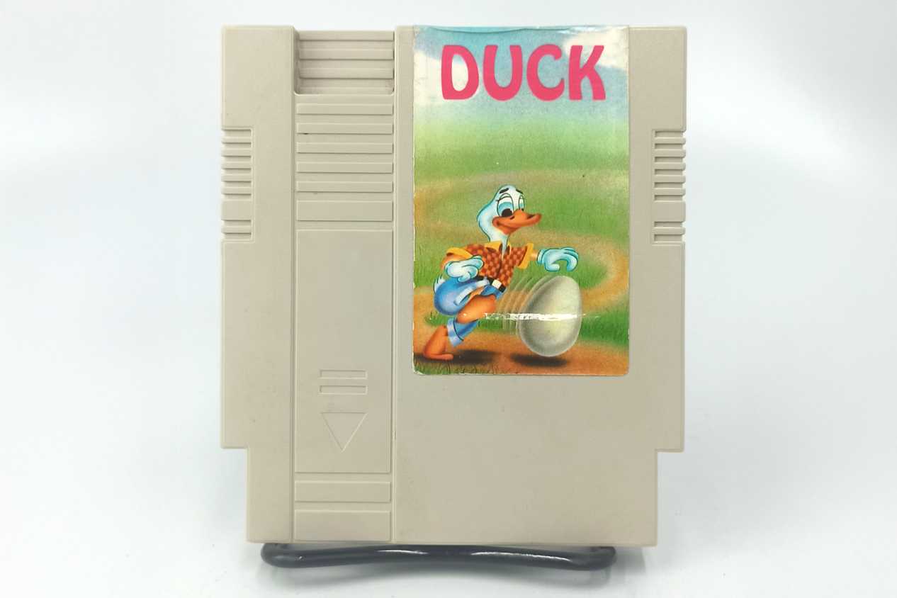 duck-cartridge-brazil-NES-front_source-livros-universo