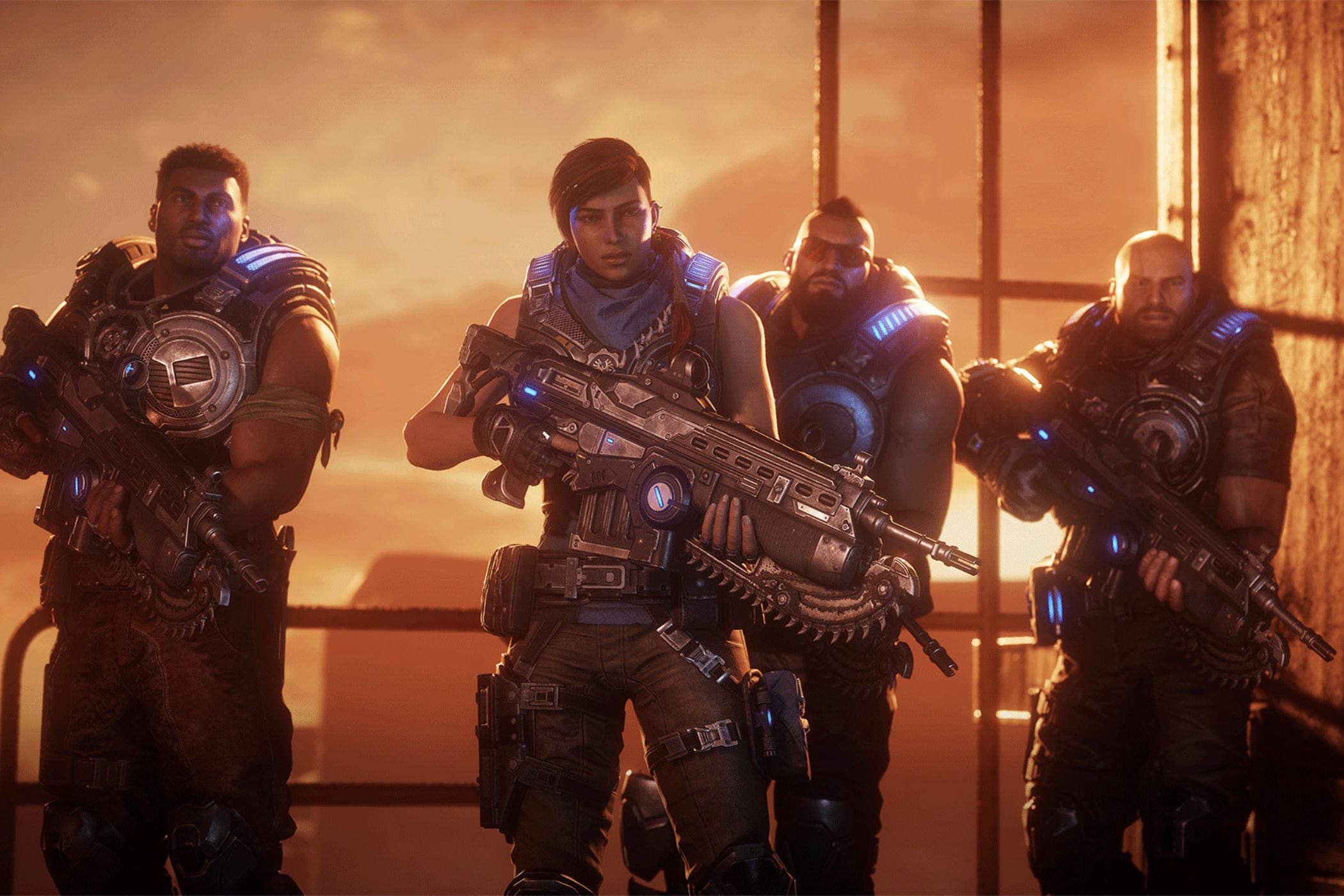 An image from the game Gears 5, showing the characters Kait Diaz, Delmont Walker, JD Fenix, and Fahz Chutani.