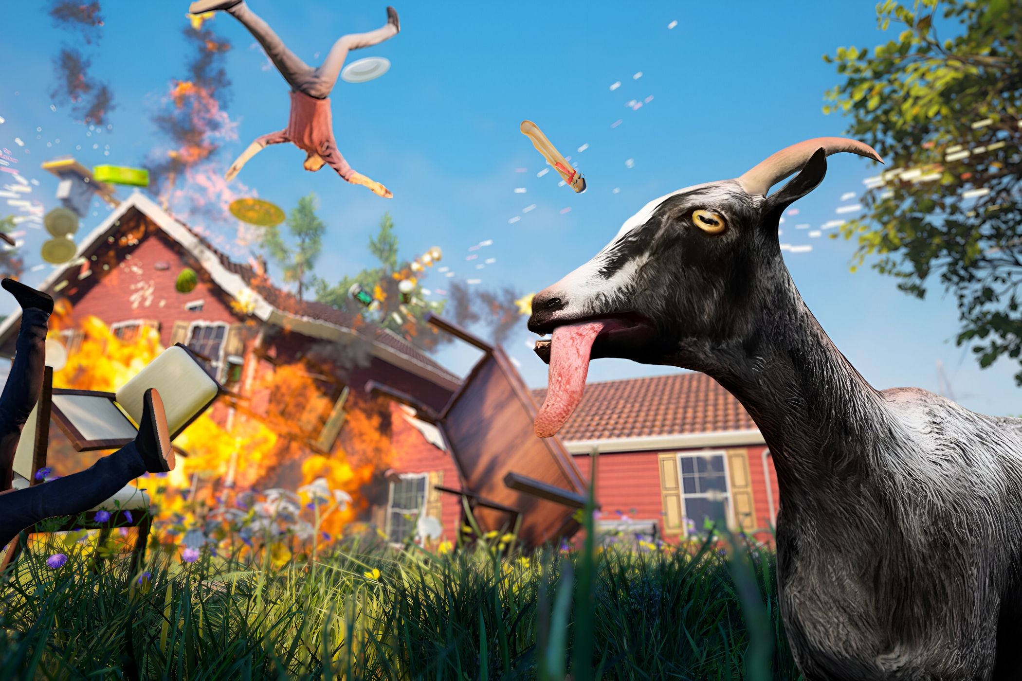 An image from the game "Goat Simulator", showing a goat in the foreground as a house burns down in the background.