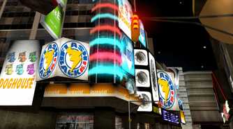 An image from the 2001 game, Grand Theft Auto III, showing a brightly-lit city street at night.