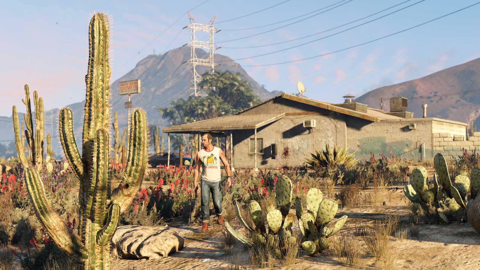 Trevor walking in front of a house in Blaine County