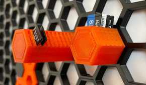 Honeycomb storage wall with SD cards attached