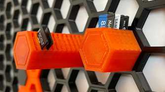 Honeycomb storage wall with SD cards attached