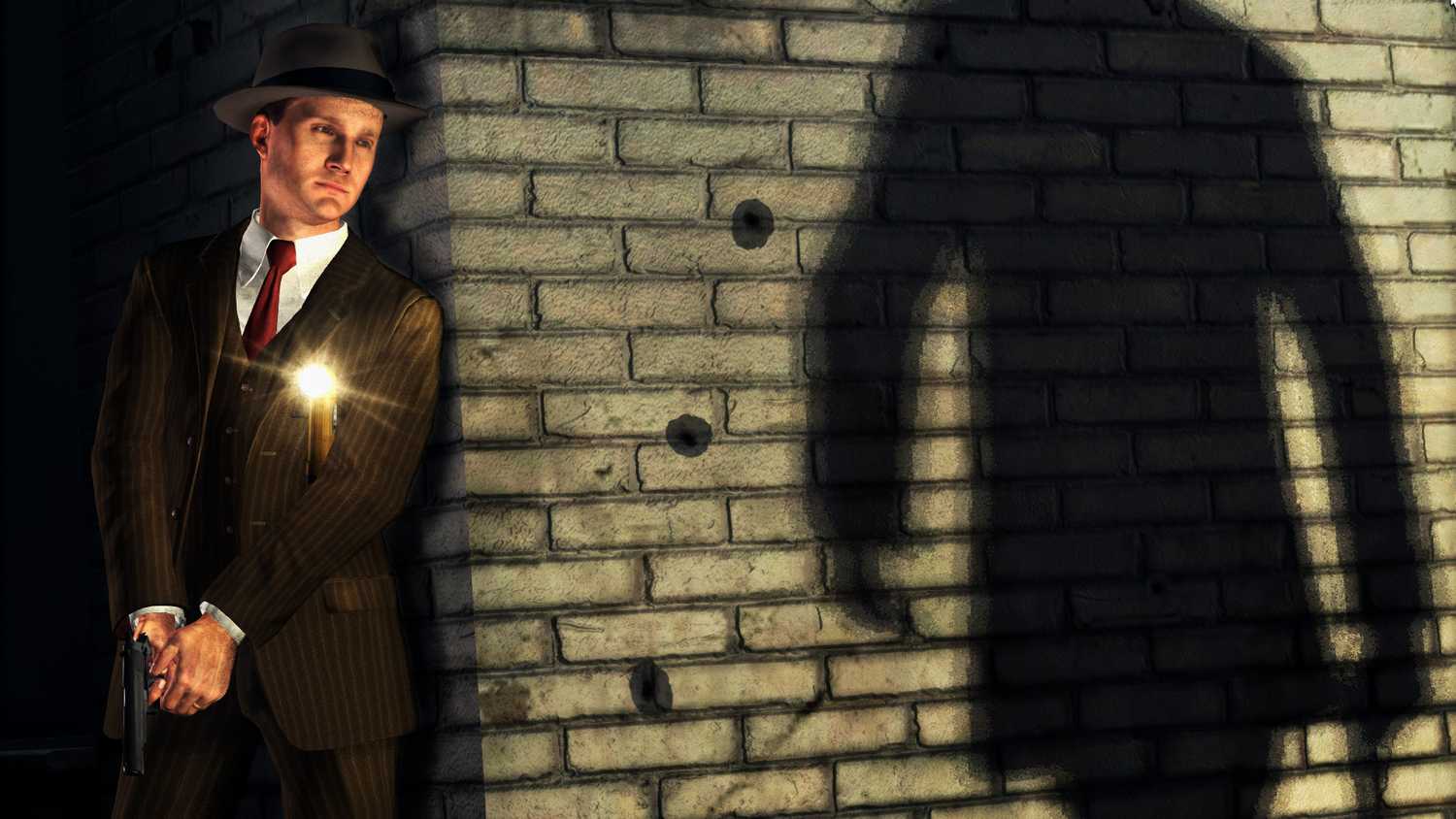 Screenshot from LA Noire video game of man waiting to turn the corner with a gun with a shadow of a man on the other side.