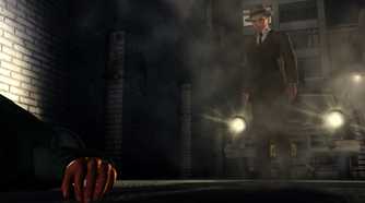 Screenshot from LA Noire video game of man staring at a body on the ground with a car behind him flashing its headlights