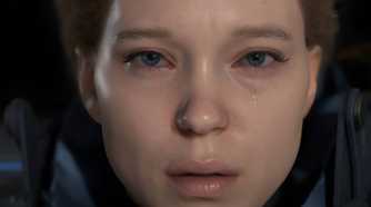 An image from the game "Death Stranding", showing actress Lea Seydoux as Fragile, staring into the camera as a teardrop rolls down her face.