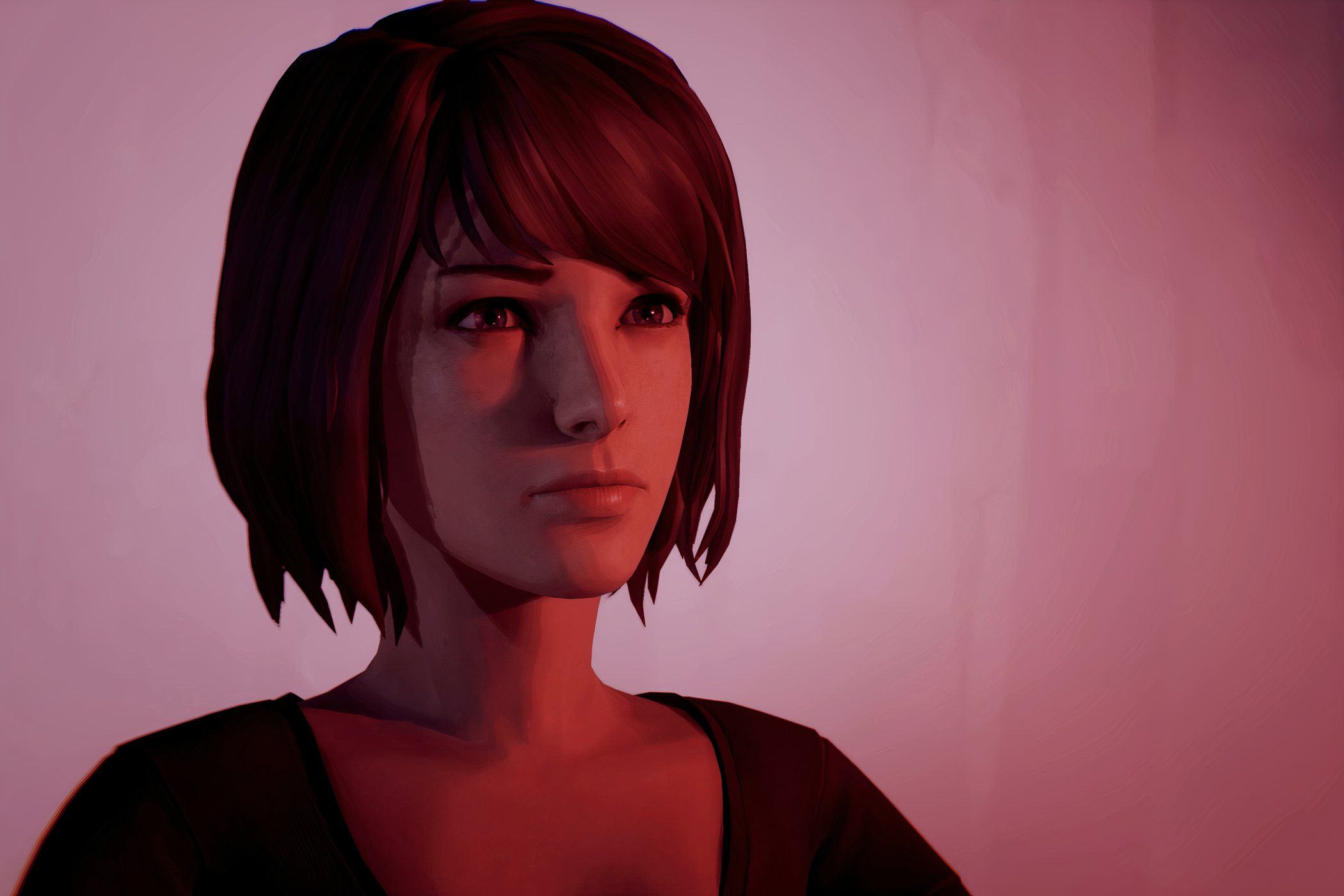 An image from the game Life is Strange, showing a girl bathed in pink light.