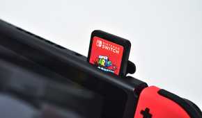 Nintendo Switch game console with a game card in the slot
