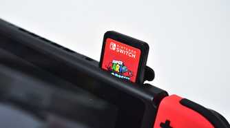 Nintendo Switch game console with a game card in the slot