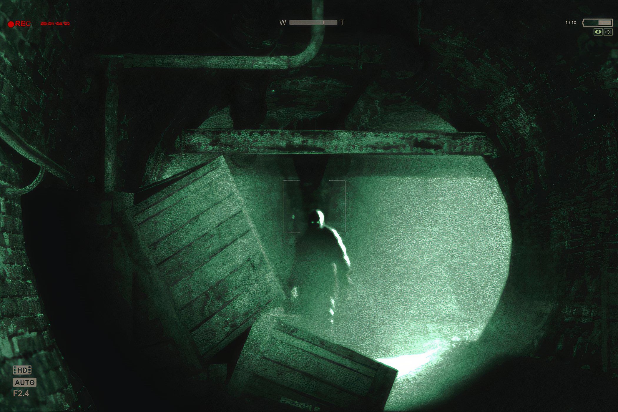 A screenshot from the game Outlast, showing a large, looming figure in the distance.